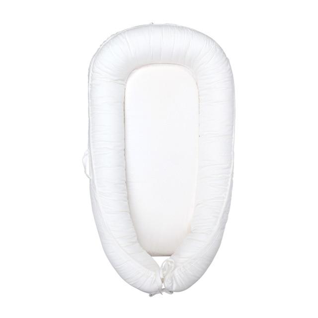 réducteur de lit bébé cocon