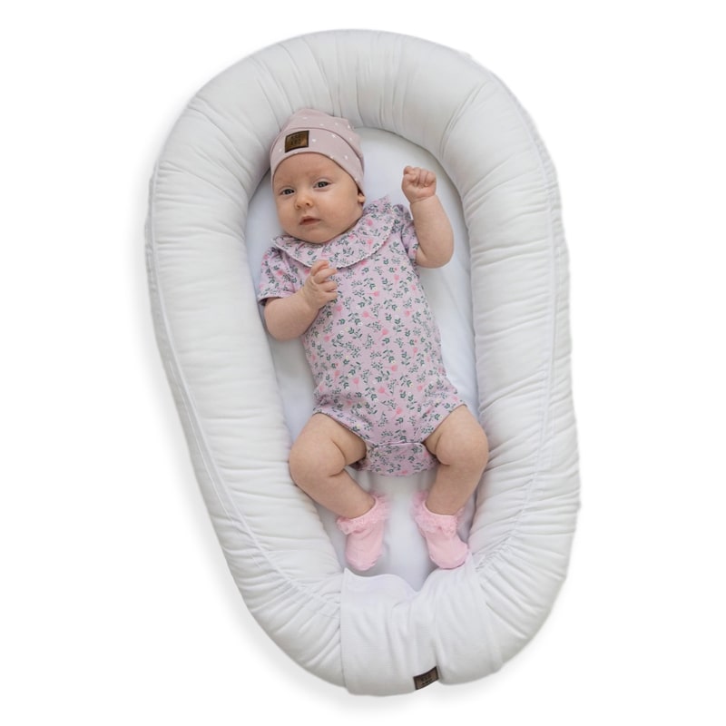 réducteur de lit blanc