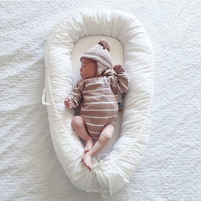 réducteur de lit bébé blanc