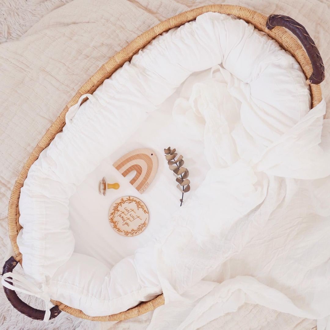 réducteur de lit bébé pour dormir